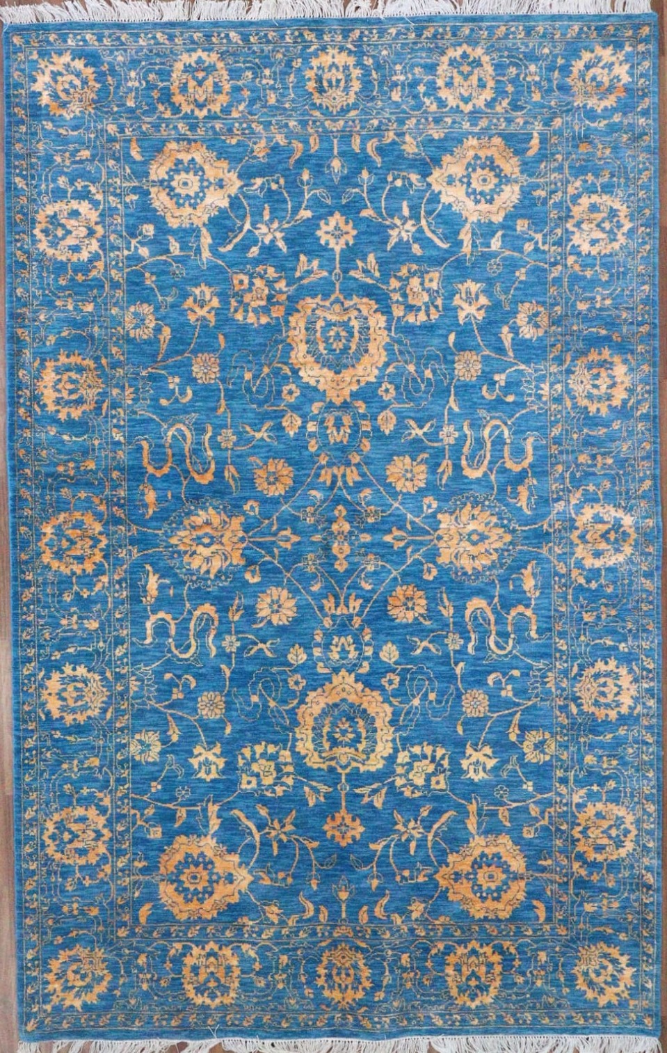 Indian artisan weaving a handmade carpet — Dhaaga Fine Arts